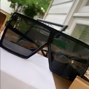 Oversized trending black shades.